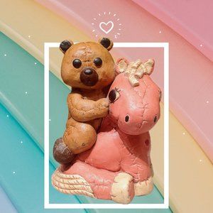 Teddy bear on Pony figurine coin saver